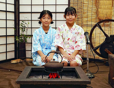 堂々とした語りを披露し、会場を沸かせた牛坂さん（左）と高橋さん