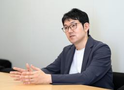 　インタビューに答える西田尚史さん