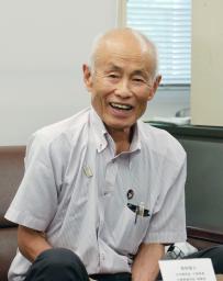 記者会見に同席した被団協の箕牧智之代表委員=18日午後、広島県庁